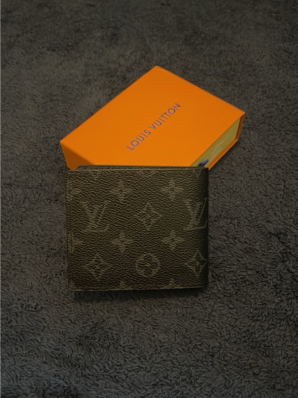 Louis Vuitton Men’s Monogram Bi-Fold Wallet in Black